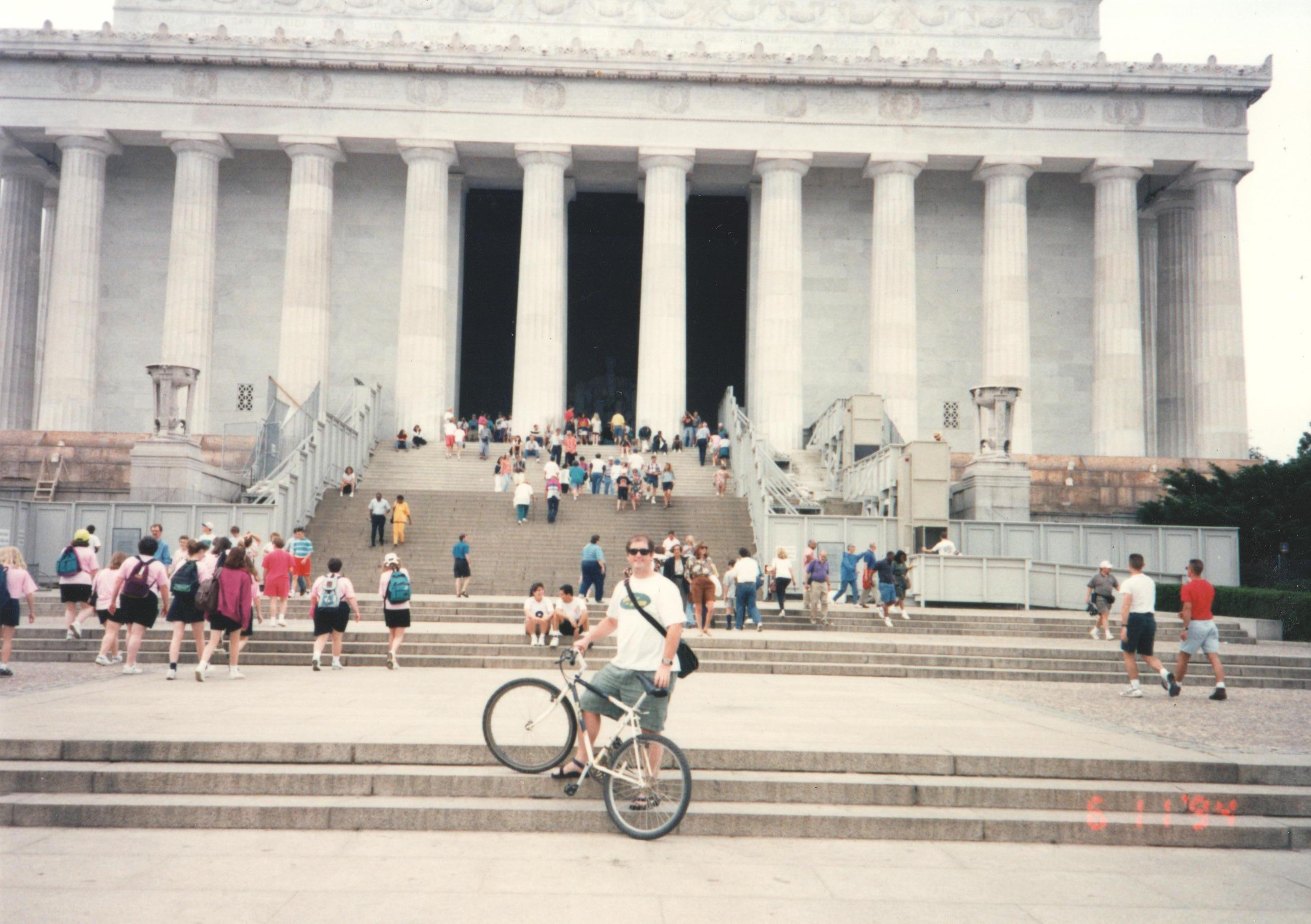 On a bicycle in front of the Lincoln Memorial, Washington DC, 1992