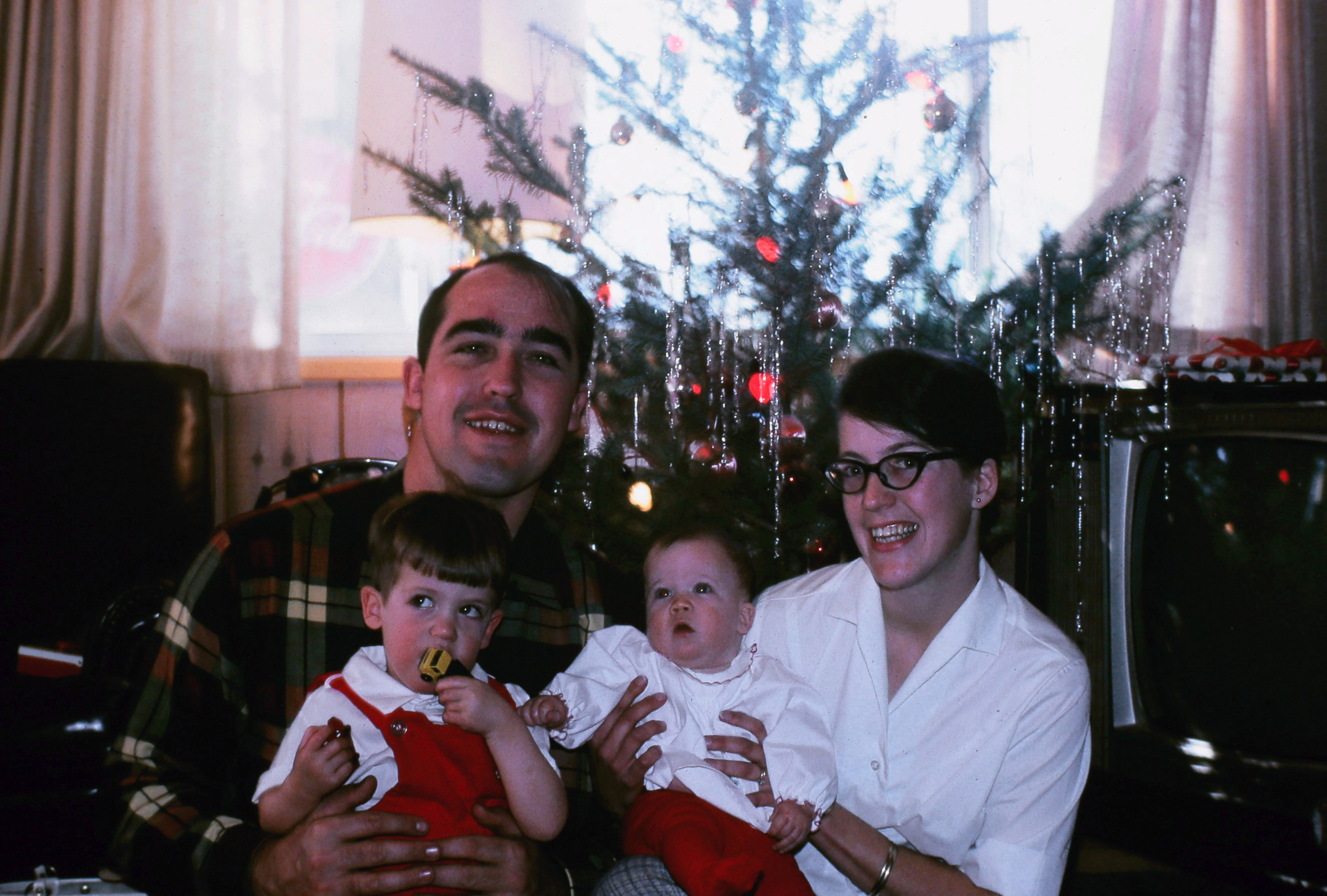 Phil and Elise with Fred (left) and Amy, Christmas ~1967. Location unknown.