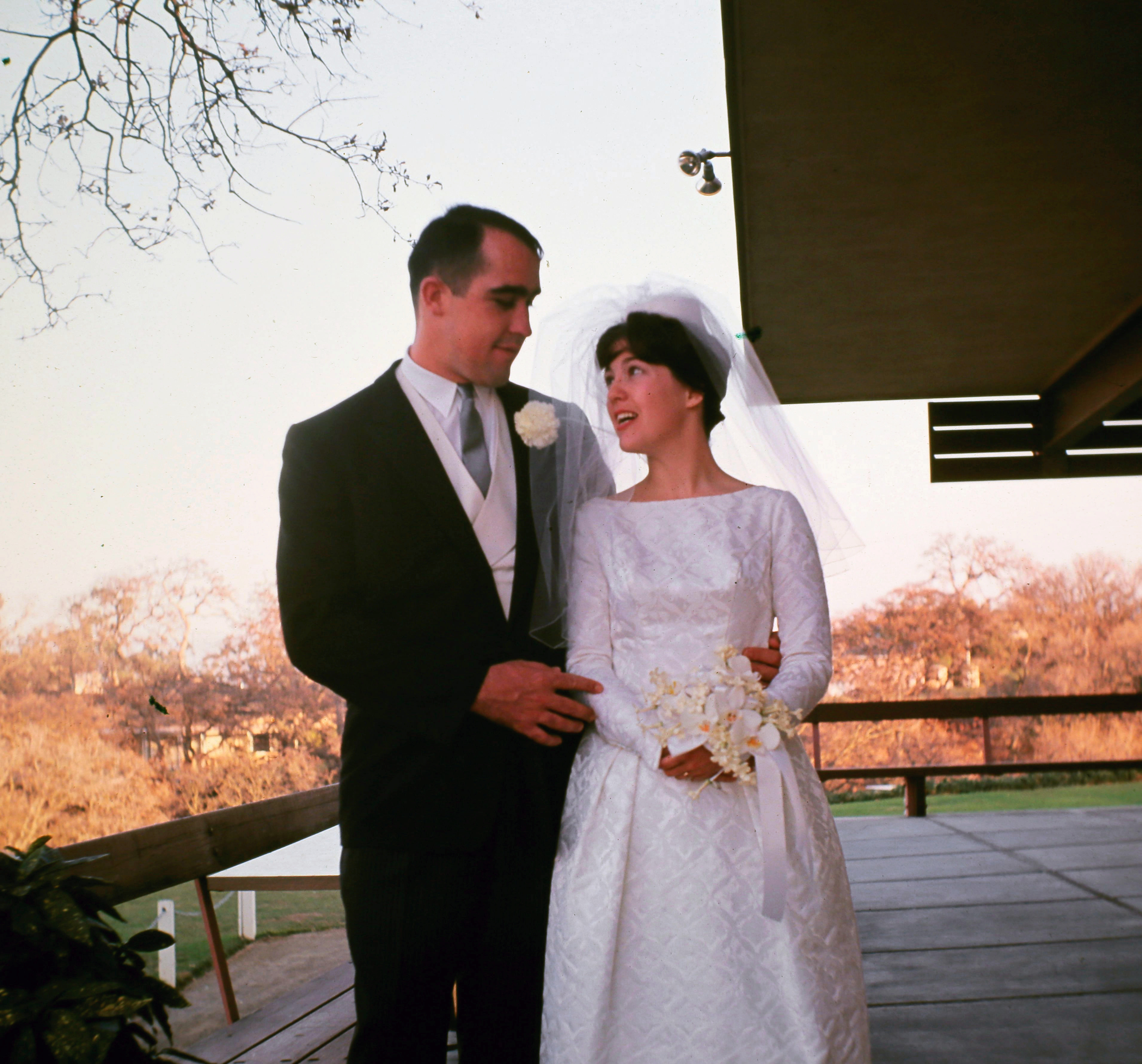 Phil and Elise Heald's wedding portrait — looking at each other, not the camera