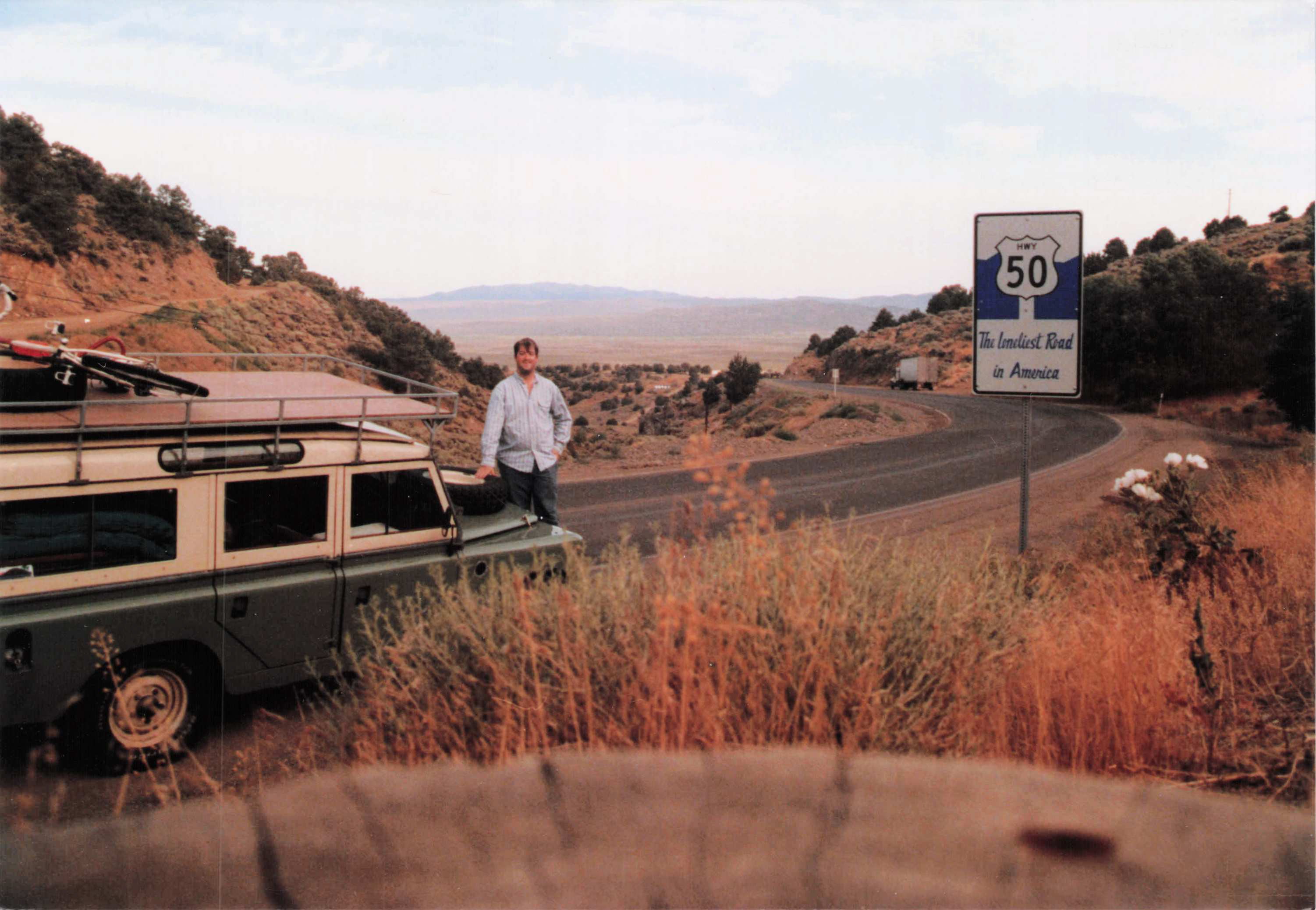 Fred with Land Rover beside US Route 50 — 'The Loneliest Road in America,' est. 1990