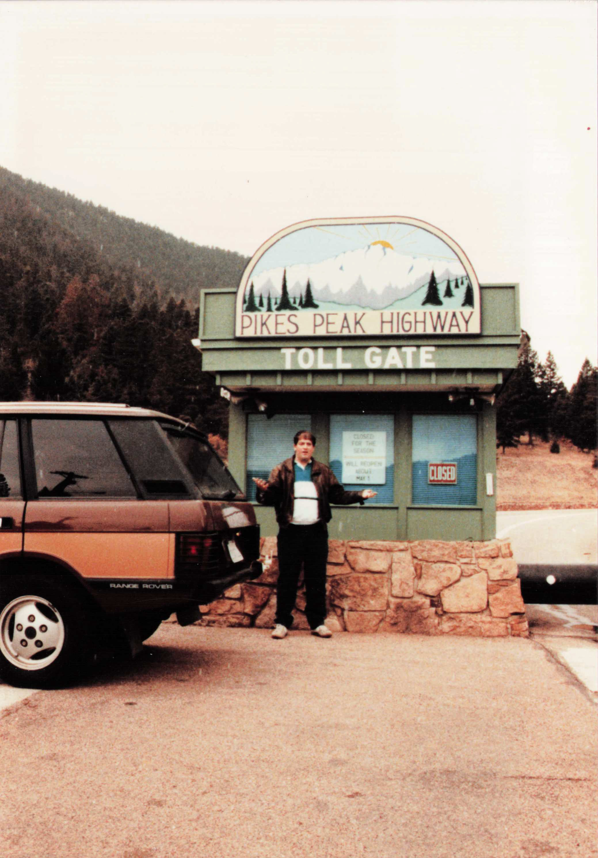 Fred at the Pikes Peak Highway toll gate, closed for the season
