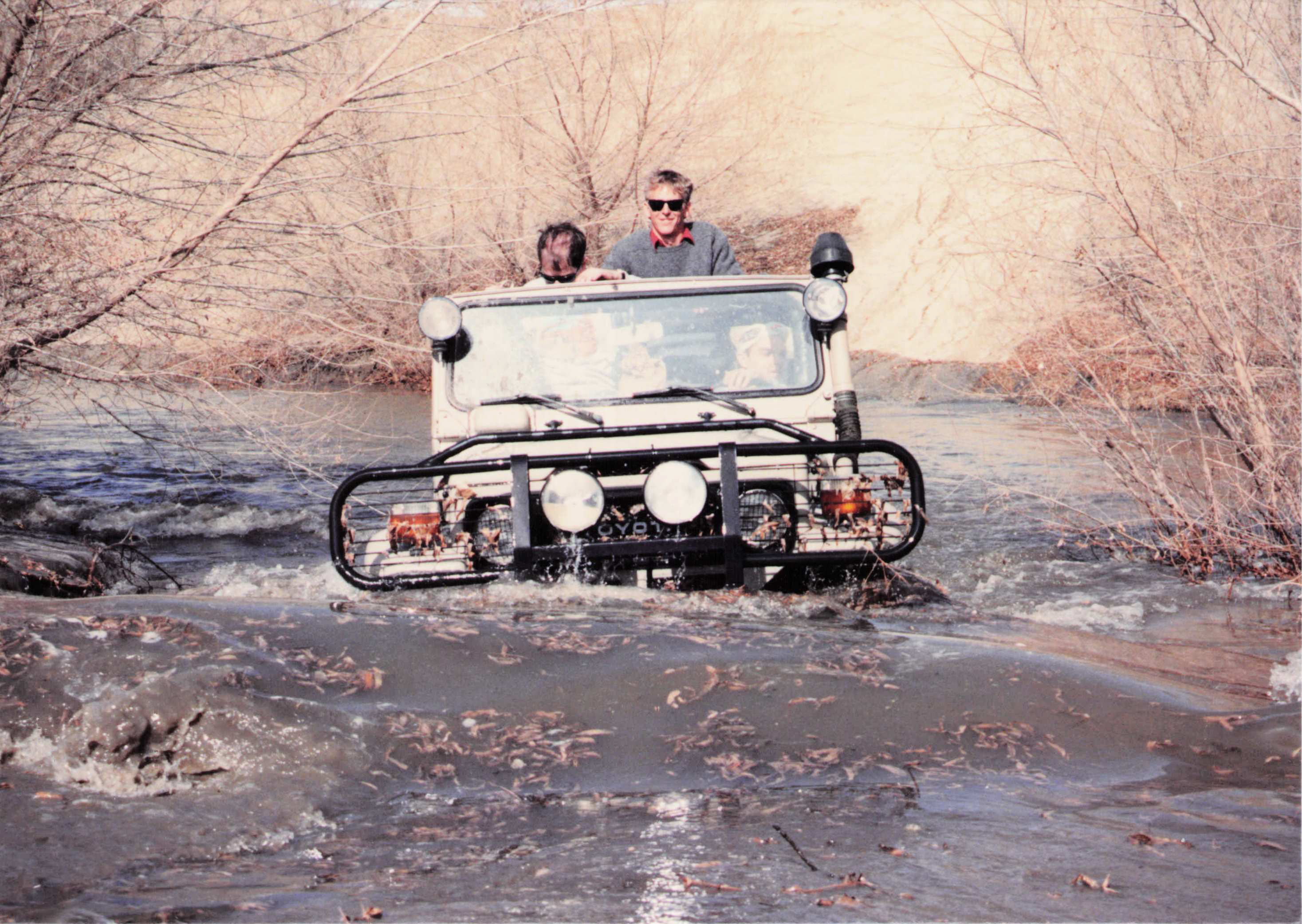 Fred standing up through the roof during the river crossing, Angeles Forest
