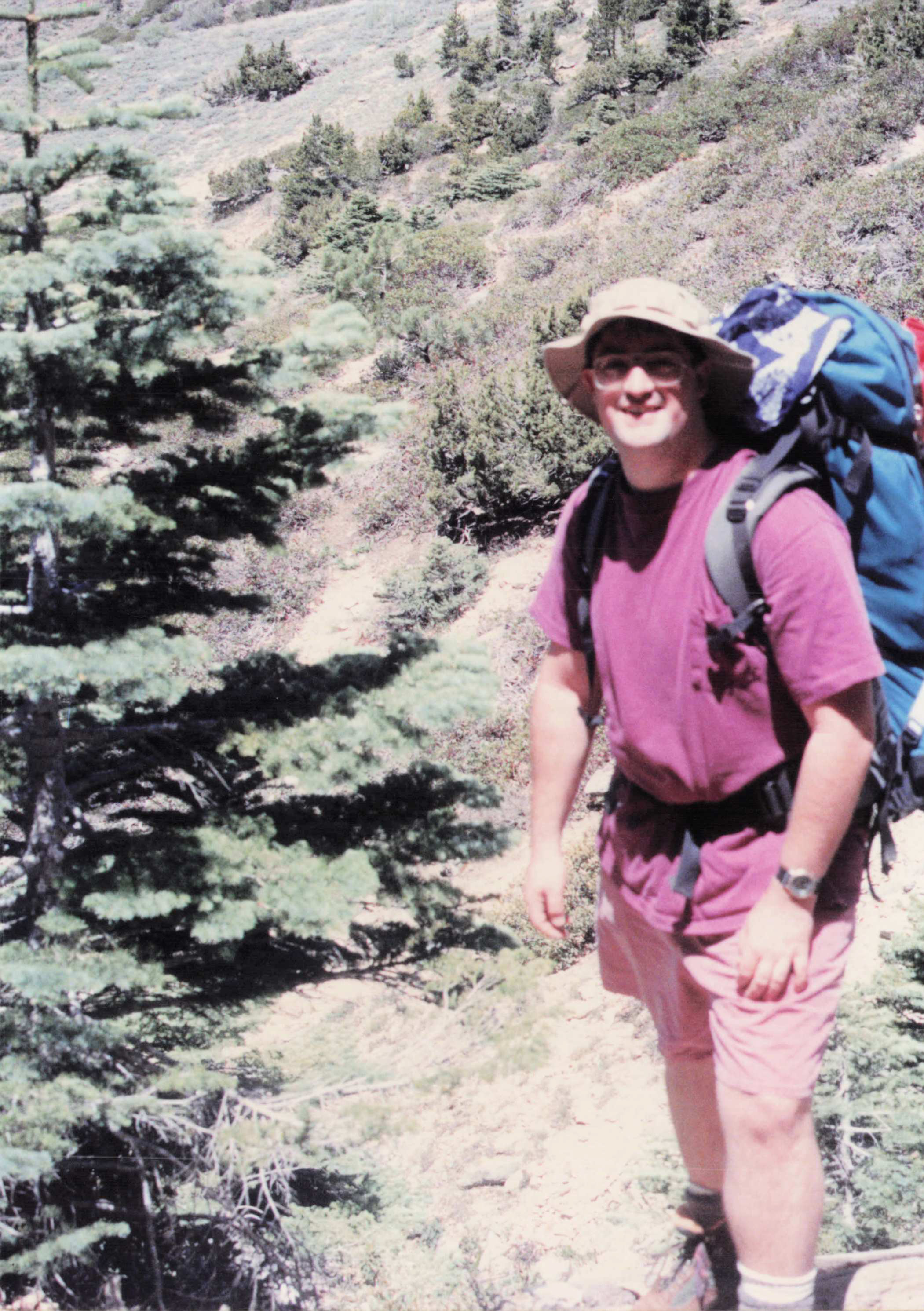 Solo backpacker on the mountain trail