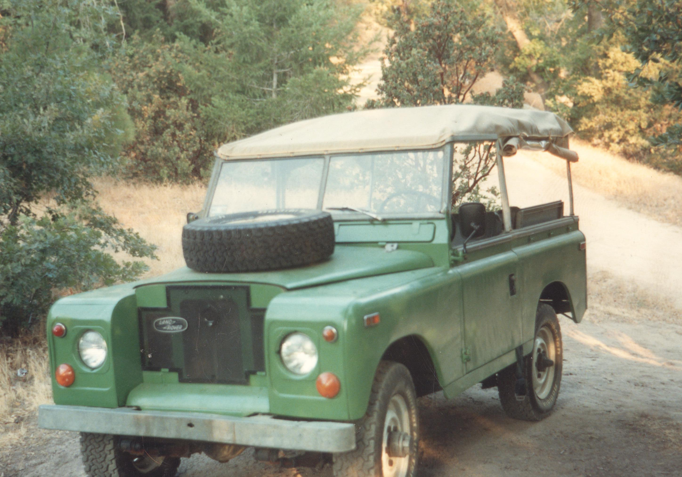 Land Rover IIA 88" RHINOTF on a California chaparral dirt road, early 1990s