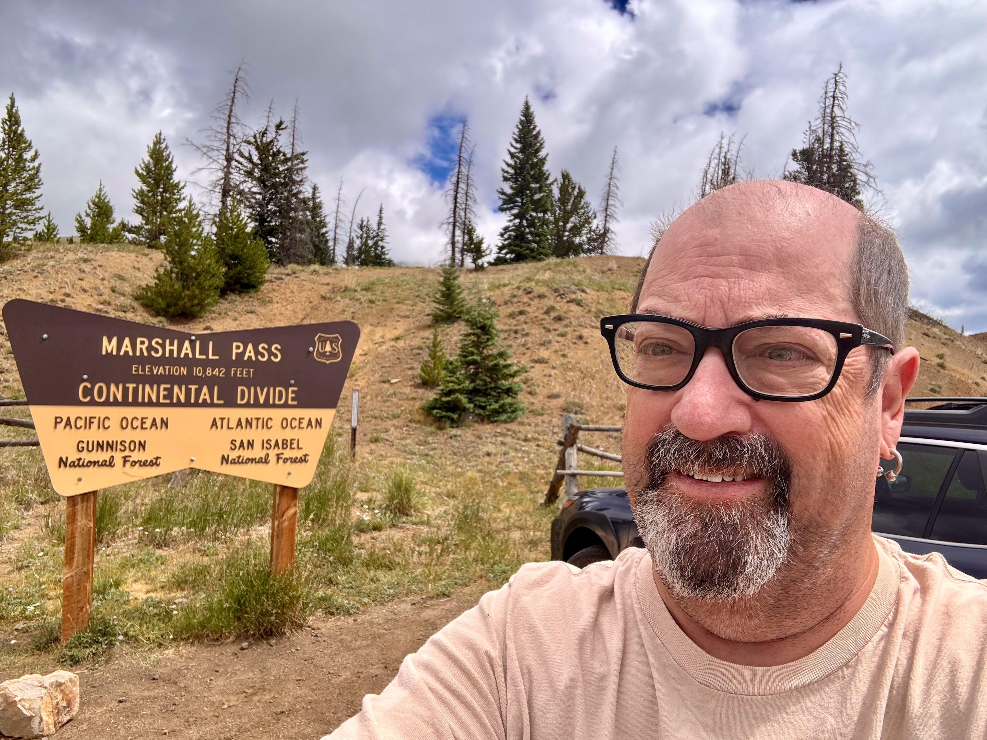 Fred at the Marshall Pass sign, Continental Divide, 10,842 feet.
