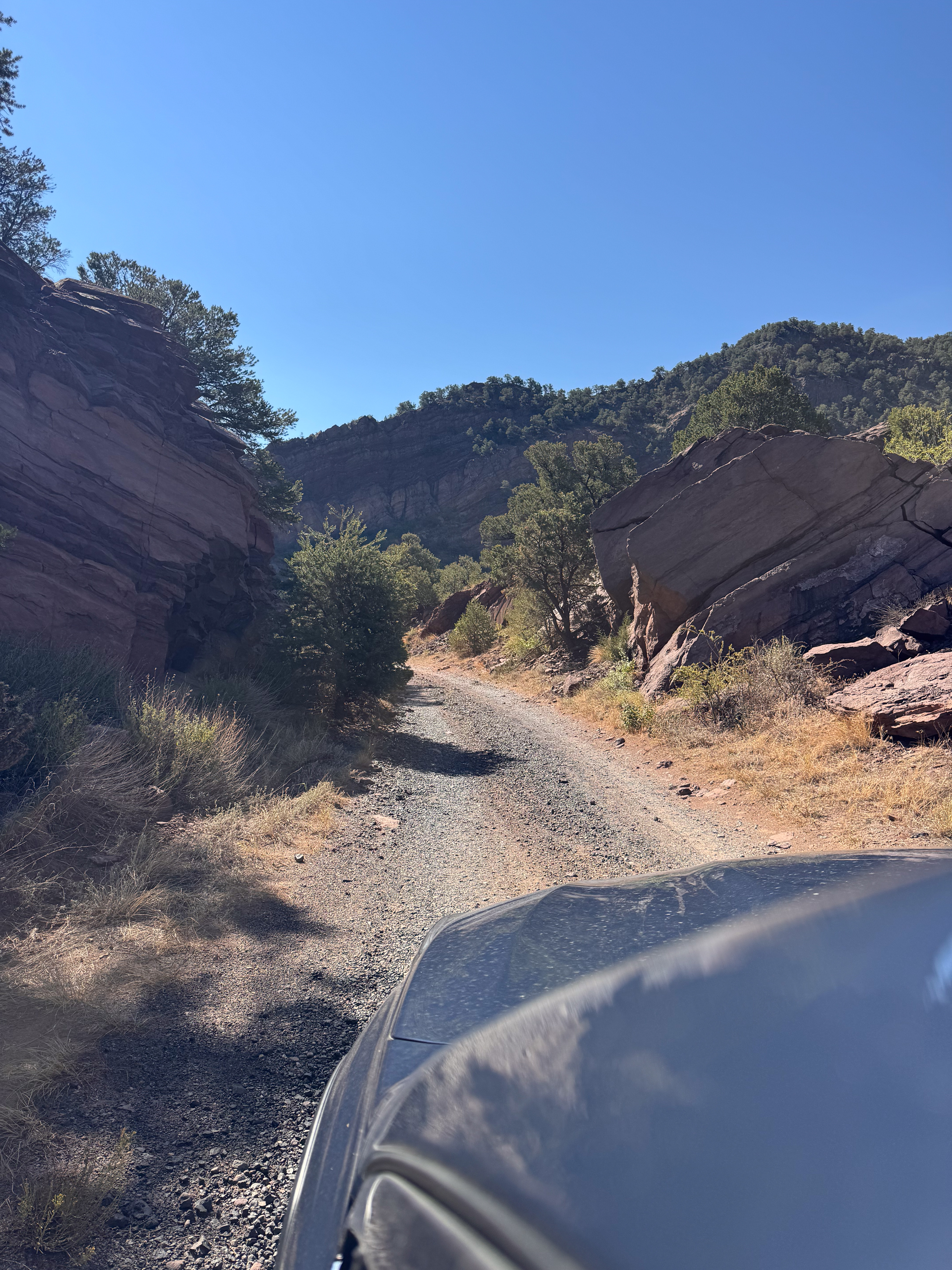 Lower Badger Creek — a narrow track squeezed between rock and river.