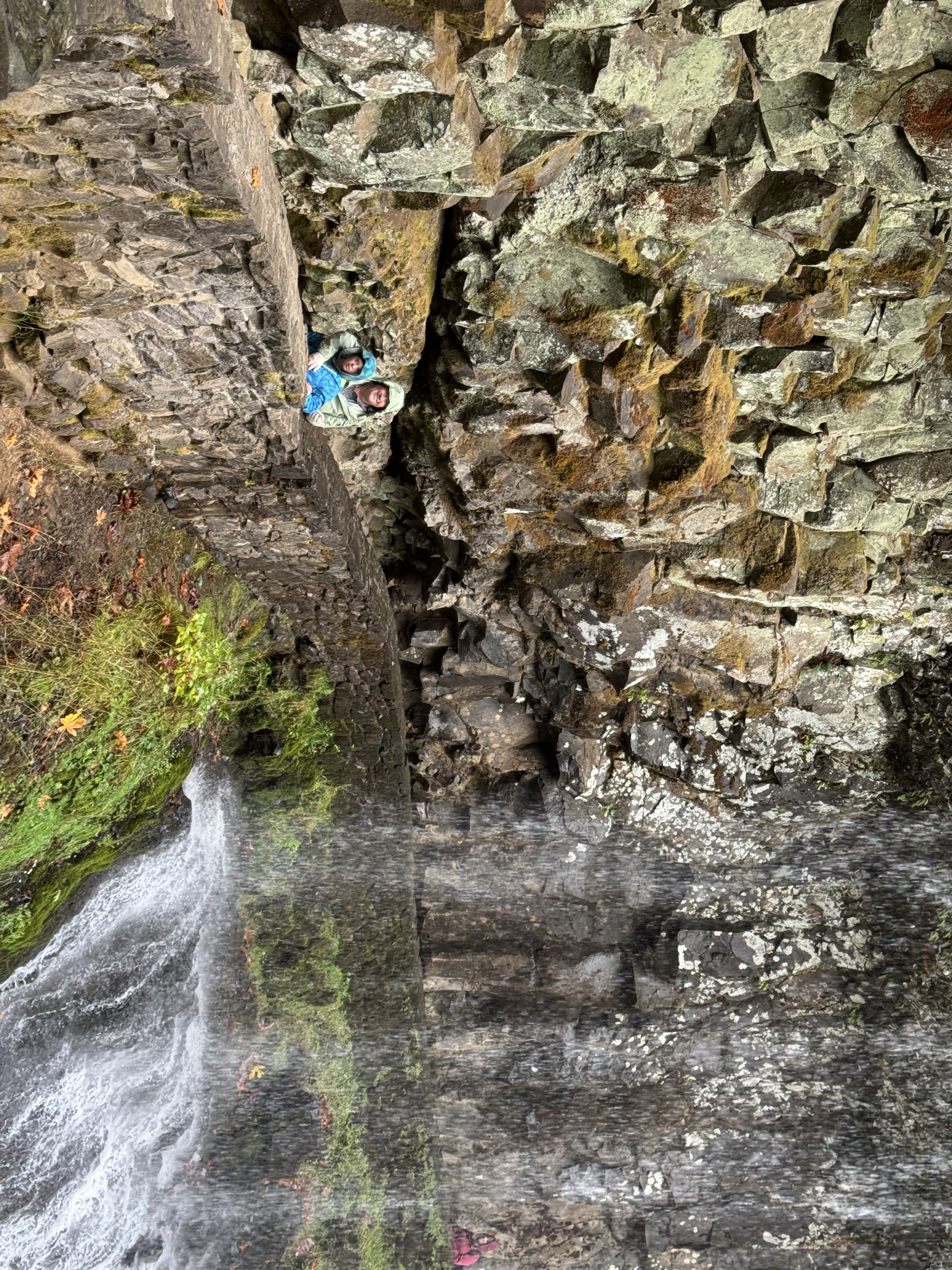 At the base of the falls